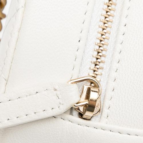 Chanel Lambskin Pearl Round Clutch with Chain
