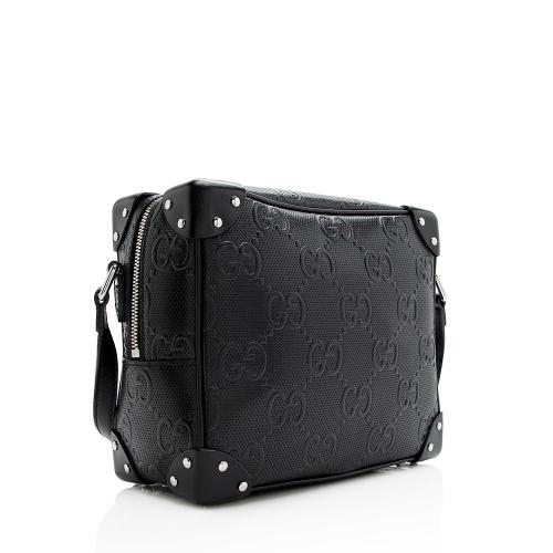 Gucci: Black GG Embossed Messenger Bag