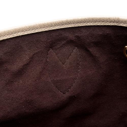 Louis Vuitton Giant Monogram Empreinte Neverfull MM Tote