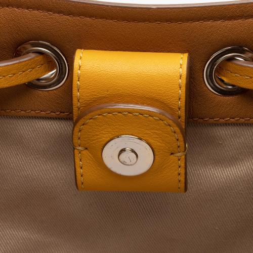 Brown embossed drawstring shoulder bag