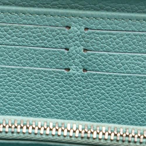 Louis Vuitton Monogram Empreinte Summer Stardust Zippy Wallet