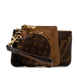 Louis Vuitton Monogram Reverse Giant Trio Pouch