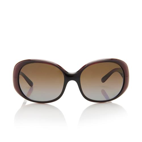 Prada Polarized Oval Sunglasses